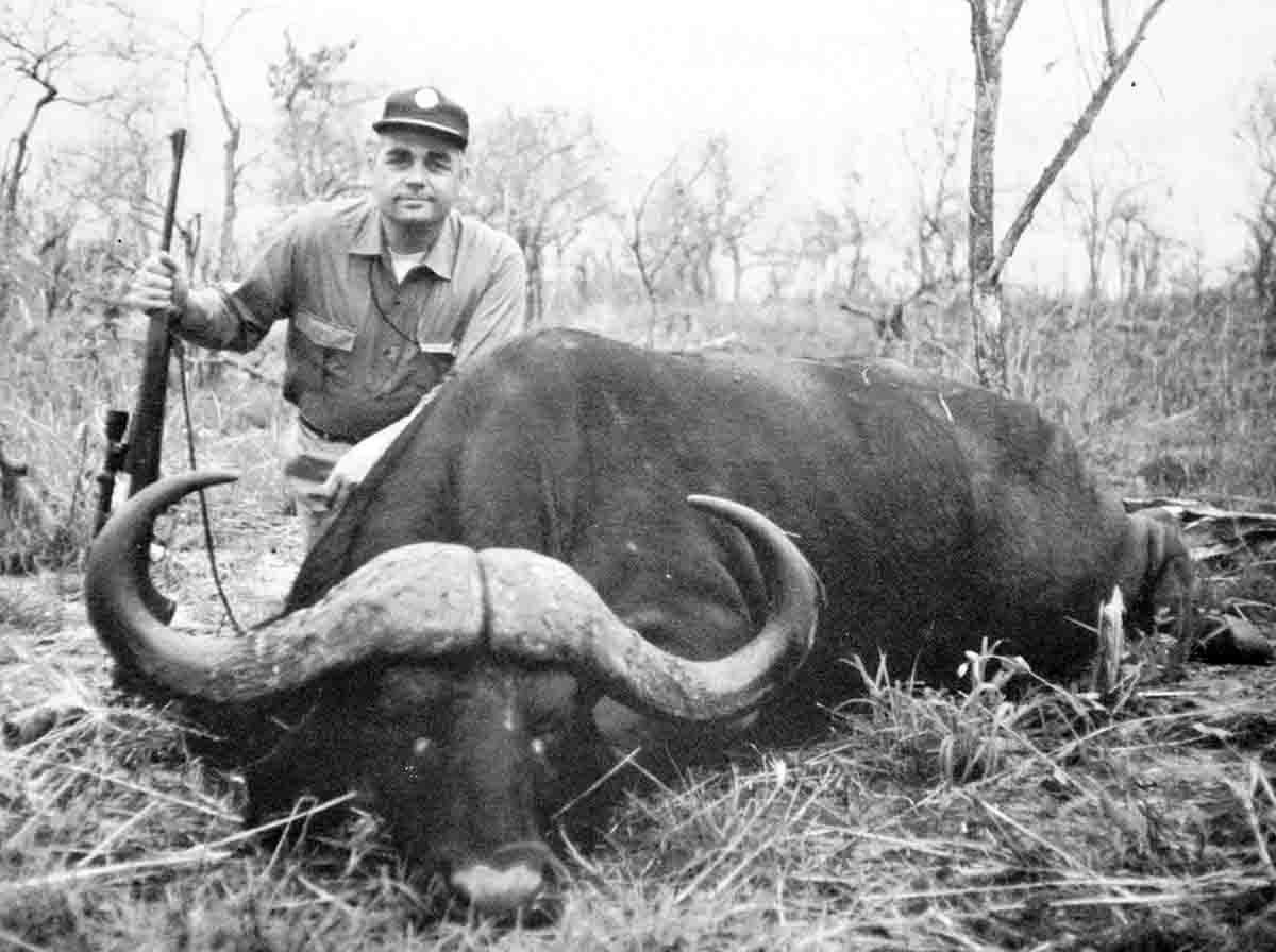 George Hoffman with a good Cape buffalo taken in Mozambique with a custom rifle on the Remington 700 action in 416 Hoffman.